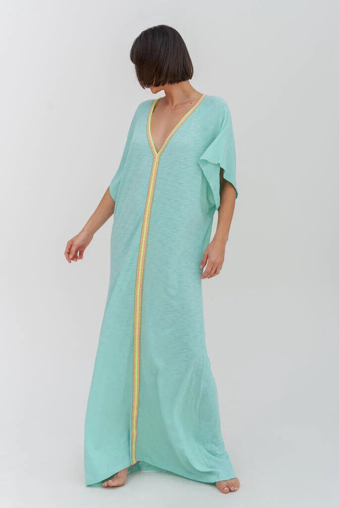 Woman in Light Blue Beach Cover Up Dress by Pitusa