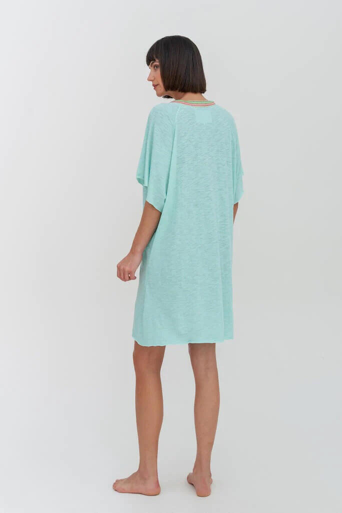 Stylish woman in Mini Beach Kaftan in Light Blue