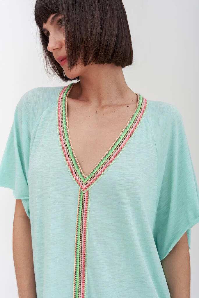 Model wearing Light Blue Mini Beach Cover Up