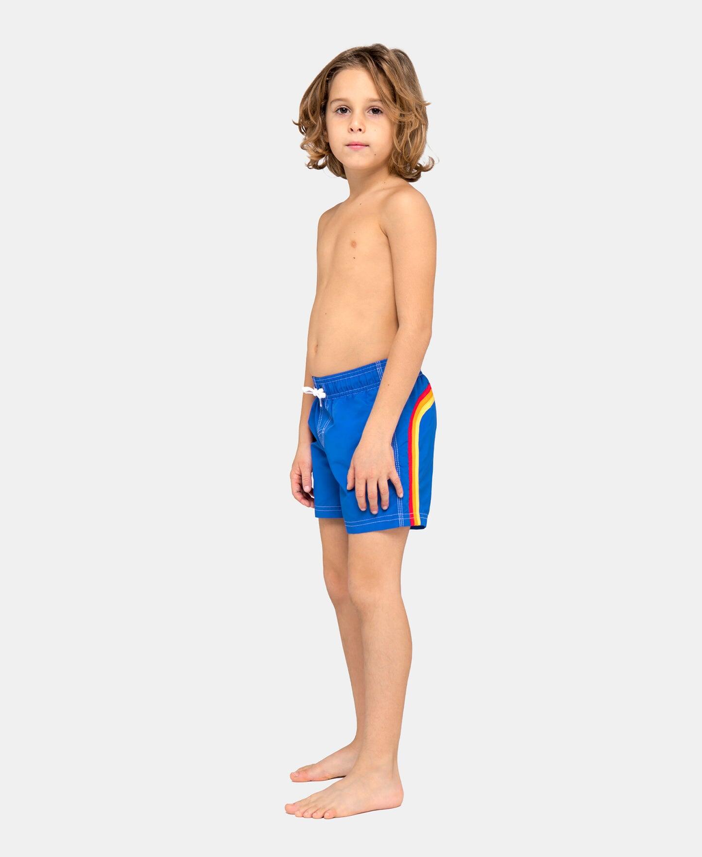 boy wearing Sundek Juniors  Blue Surf Trunks