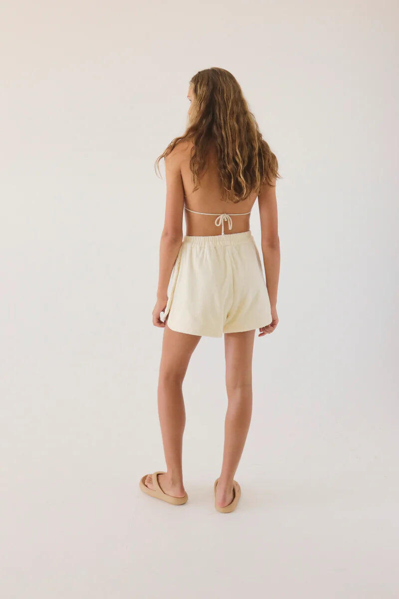 Woman Wearing White Beach Shorts