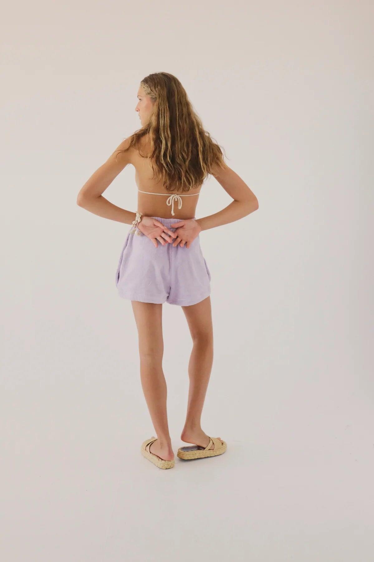 Woman Wearing Lavender Terry Shorts